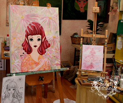 working on two paintings in the studio by janell Mithani